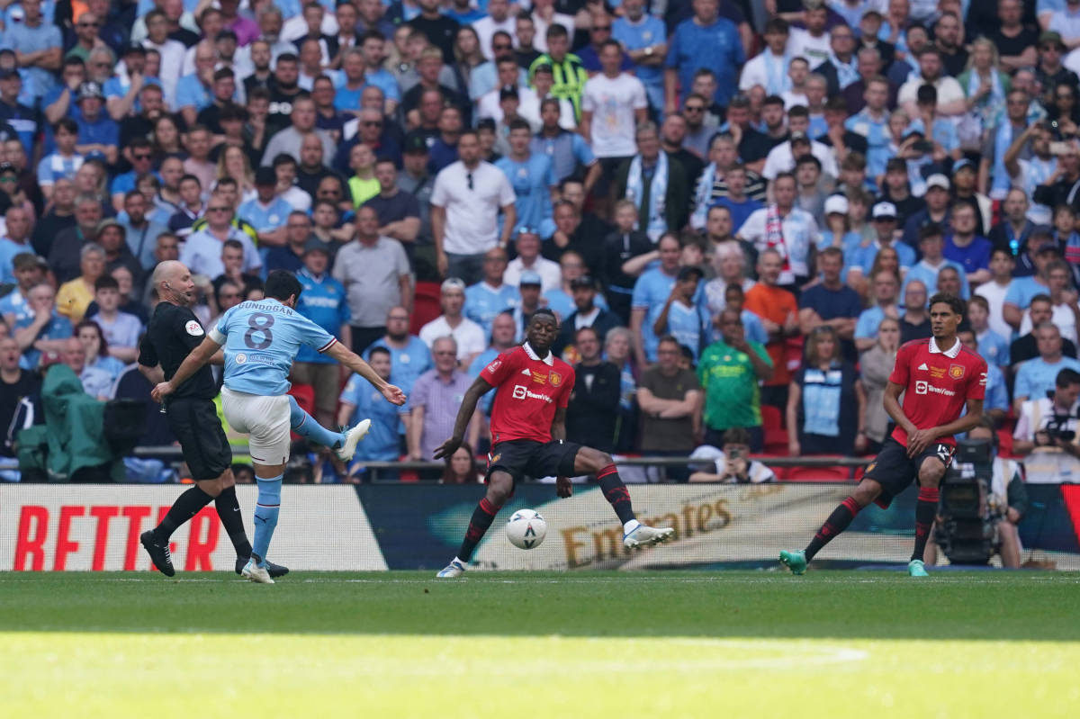 Manchester City no.8 Ilkay Gundogan pictured scoring his second goal of the 2023 FA Cup final against Manchester United